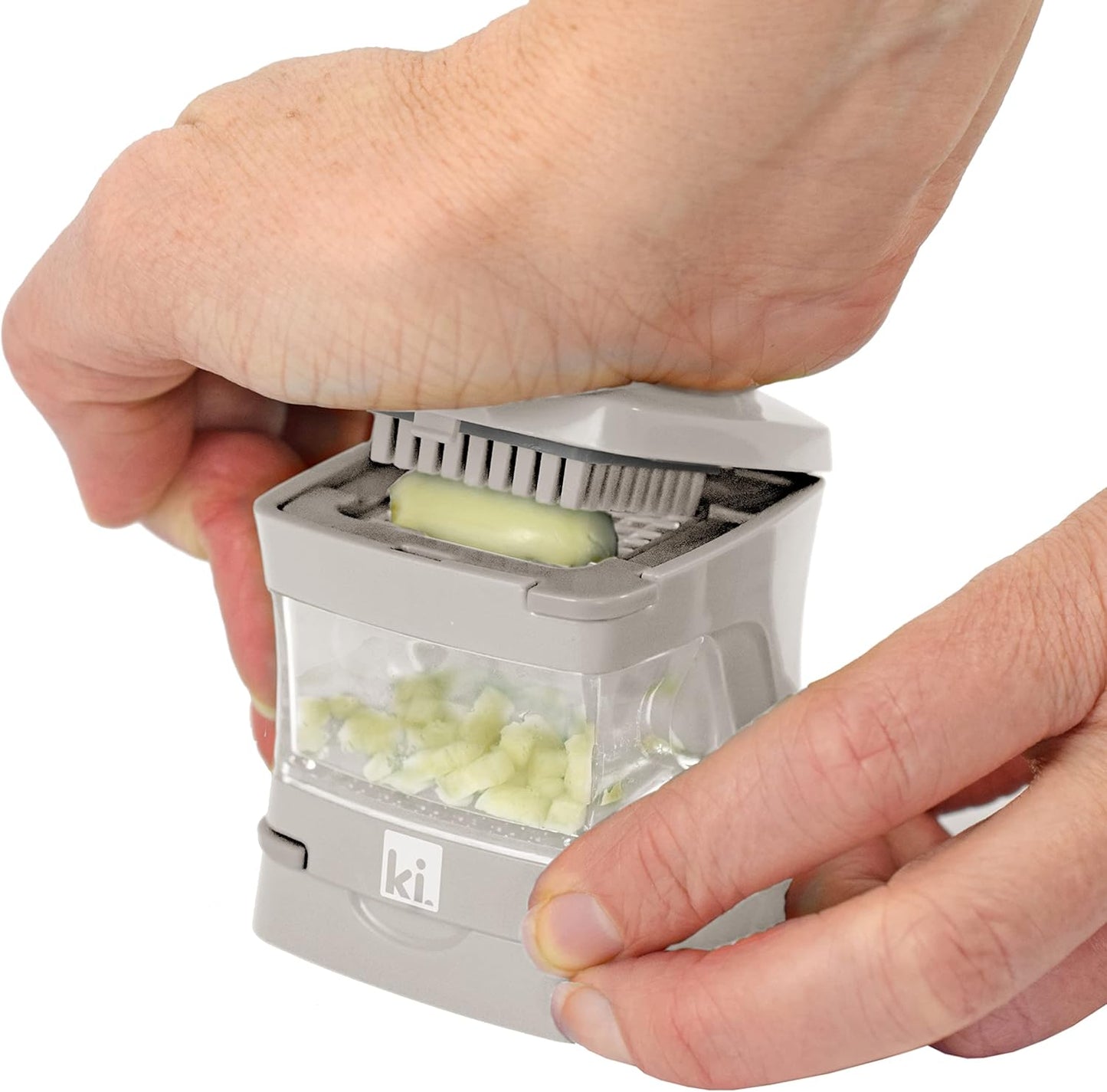 Garlic-A-Peel Garlic Press, Crusher, Cutter, Mincer, and Storage Container - Includes Silicone Garlic Peeler - Easy to Clean - Stainless Steel Blades – (Cream), standard